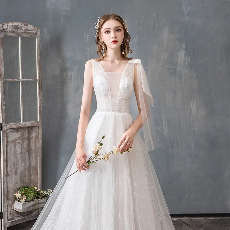 Chic A Line Beach Wedding Dresses Short Sleeves with Lace Appliques Bride Gowns Light Fairy Beach Bridal Gowns Vestido de noiva
Chic A Line Beach Wedding Dresses Short Sleeves with Lace Appliques Bride Gowns Light Fairy Beach Bridal Gowns Vestido de noiva