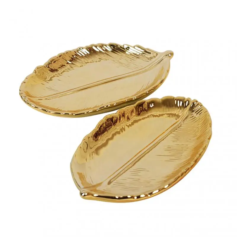 1pcs Cerami Storage Tray Gold Kitchen Leafd Dried Fruit Plate Freezing Candy Tray Jewelry Display Key Tray Home Decoration Gifts
1pcs Cerami Storage Tray Gold Kitchen Leafd Dried Fruit Plate Freezing Candy Tray Jewelry Display Key Tray Home Decoration Gifts