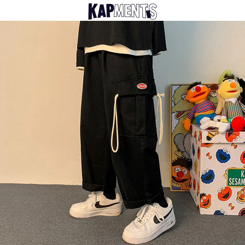 KAPMENTS Men String Pockets Streetwear Cargo Pants 2022 Spring Mens Patchwork Fashions Wide Legs Sweatpants Male Black Joggers 
KAPMENTS Men String Pockets Streetwear Cargo Pants 2022 Spring Mens Patchwork Fashions Wide Legs Sweatpants Male Black Joggers