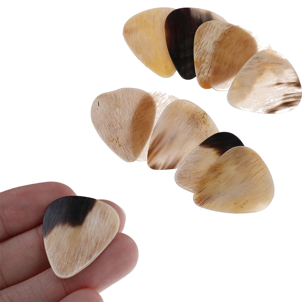 1/8Pcs Buffalo Horn Guitar Pick Hand Made Guitar Picks Plectrum Electric Smooth Guitar Pick Bass Acoustic Picks
1/8Pcs Buffalo Horn Guitar Pick Hand Made Guitar Picks Plectrum Electric Smooth Guitar Pick Bass Acoustic Picks
