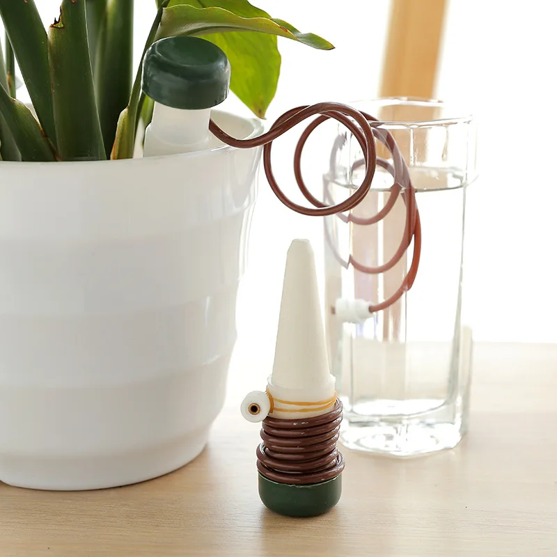 2pcs/lot Automatic Watering System Flower Plant Waterer Water Drip Irrigation Waterer Tool Indoor Plants Garden Tools Hot
2pcs/lot Automatic Watering System Flower Plant Waterer Water Drip Irrigation Waterer Tool Indoor Plants Garden Tools Hot
