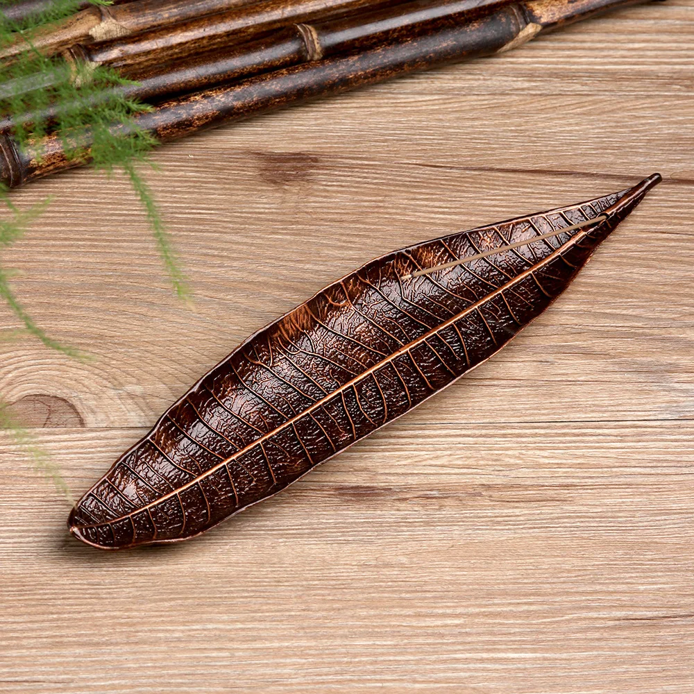 Sandalwood incense burner imitation copper Bodhi leaf incense burner alloy incense burner living room incense burner tool
Sandalwood incense burner imitation copper Bodhi leaf incense burner alloy incense burner living room incense burner tool
