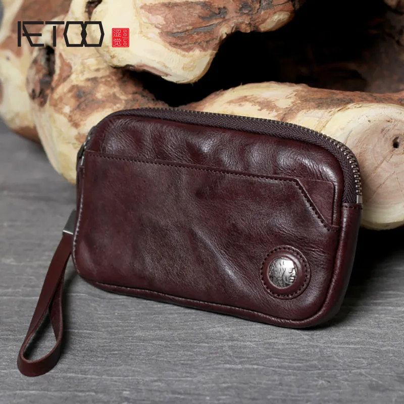 AETOO Vintage leather long clutch, vegetable tanned leather zipper wallet, first layer leather mobile phone bag
AETOO Vintage leather long clutch, vegetable tanned leather zipper wallet, first layer leather mobile phone bag