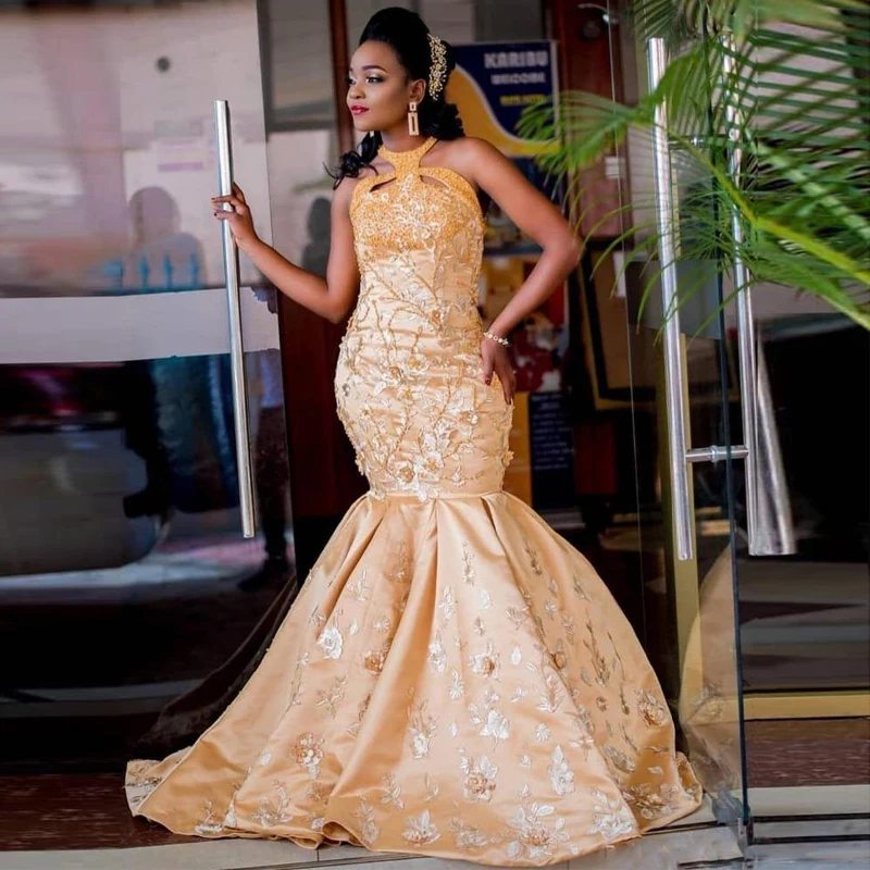 Luxury Gold Mermaid Evening Dresses Halter Bead Sequined 3D Floral Appliques Evening Gown Satin Long Prom Dress
Luxury Gold Mermaid Evening Dresses Halter Bead Sequined 3D Floral Appliques Evening Gown Satin Long Prom Dress