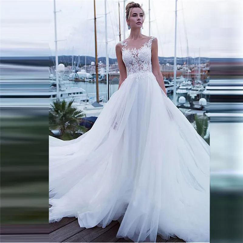 Simple Scoop Neck Tulle A-Line Wedding Dress Lace Appliques Buttons Back Tulle Skirt Bridal Gowns Sleeveless Robe De Mariee
Simple Scoop Neck Tulle A-Line Wedding Dress Lace Appliques Buttons Back Tulle Skirt Bridal Gowns Sleeveless Robe De Mariee