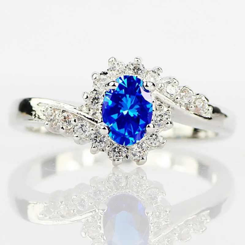 JK Fashion Engagement Ring Inlaid Oval Cubic Zirconia Exquisite Flower Shape Princess Bride Wedding Ring Jewlery for Women
JK Fashion Engagement Ring Inlaid Oval Cubic Zirconia Exquisite Flower Shape Princess Bride Wedding Ring Jewlery for Women