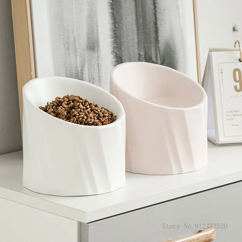 Pet bowl ceramic cat bowl dog bowl oblique mouth high bowl cat food bowl protection spine flat face double bowl pet supplies
Pet bowl ceramic cat bowl dog bowl oblique mouth high bowl cat food bowl protection spine flat face double bowl pet supplies