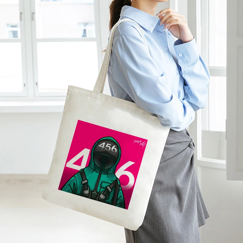 Cute Squid Game 456 Round Six Anime Canvas Bag Shopper Bag Vintage Shoulder Bags Tote Large Capacity Women Bag College Handbag
Cute Squid Game 456 Round Six Anime Canvas Bag Shopper Bag Vintage Shoulder Bags Tote Large Capacity Women Bag College Handbag