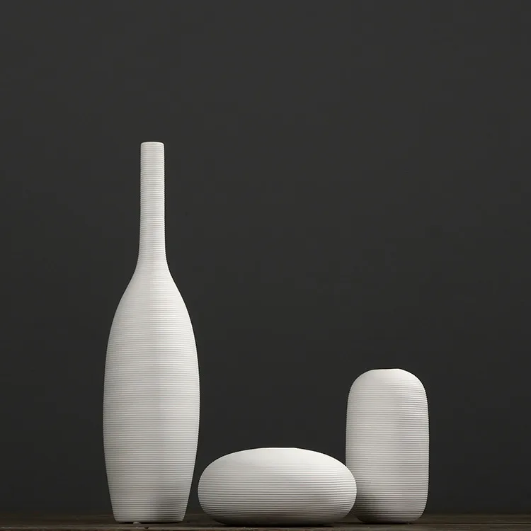 Northern European-Style White Ceramic Vase Set Decoration Modern Minimalist Flower Container Living Room Home Decoration
Northern European-Style White Ceramic Vase Set Decoration Modern Minimalist Flower Container Living Room Home Decoration