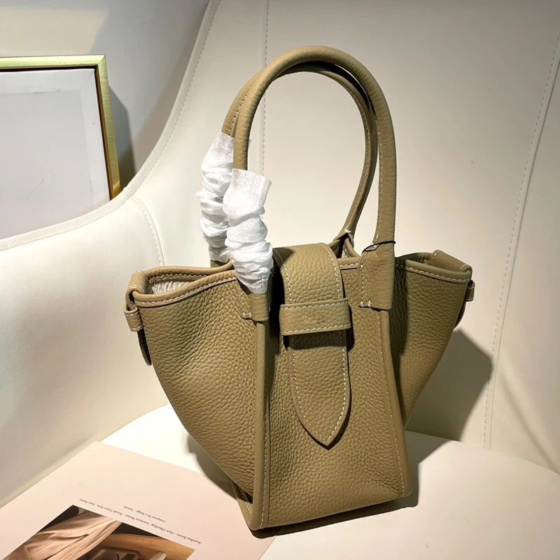 YOUSU Japanese niche brand V home ASIC high-end commuter leather wings one-shoulder lychee pattern bucket tote bag handbag 2021
YOUSU Japanese niche brand V home ASIC high-end commuter leather wings one-shoulder lychee pattern bucket tote bag handbag 2021