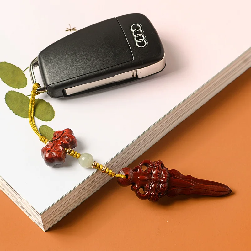 Small leaf red sandalwood gluttonous animal face phone chain Ruyi sword mobile phone lanyard custom mobile phone case pendant 
Small leaf red sandalwood gluttonous animal face phone chain Ruyi sword mobile phone lanyard custom mobile phone case pendant