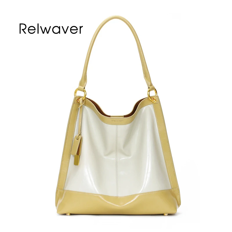 Big cowhide shoulder bag genuine leather soft tote bag contrast color blue yellow women handbag folding composite ol commute bag 
Big cowhide shoulder bag genuine leather soft tote bag contrast color blue yellow women handbag folding composite ol commute bag