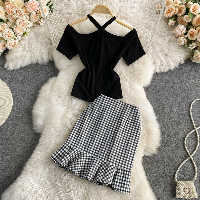 Sexy slim cross strapless short-sleeved T-shirt two-piece suit high waist plaid bag hip fishtail skirt short skirt summer
Sexy slim cross strapless short-sleeved T-shirt two-piece suit high waist plaid bag hip fishtail skirt short skirt summer