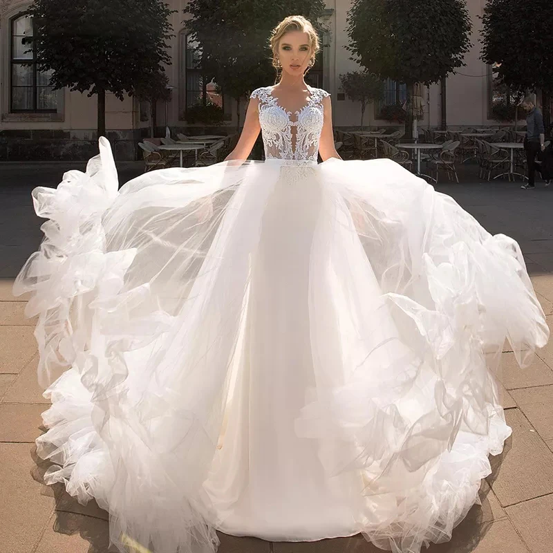 Bohemian Wedding Dresses 2021 V-Neck Cap Sleeve Beach A-Line Illusion Country Bridal Gowns with Detachable vestido de novia
Bohemian Wedding Dresses 2021 V-Neck Cap Sleeve Beach A-Line Illusion Country Bridal Gowns with Detachable vestido de novia