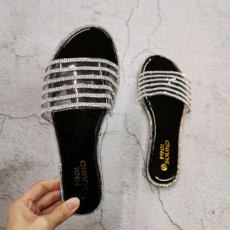 2020 New Summer Crystal Female Slippers Flat Ladies Beach Shoes Shiny Diamond Party Rubber Bottom Ladies Footwear Large Size 41
2020 New Summer Crystal Female Slippers Flat Ladies Beach Shoes Shiny Diamond Party Rubber Bottom Ladies Footwear Large Size 41