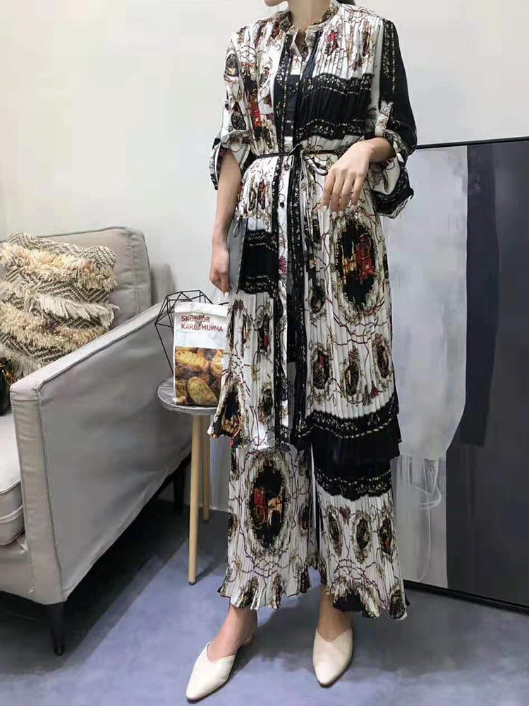 Round neck multicolor printing long shirt two-piece suit women's autumn new style + pleated elastic waist wide leg pants suit
Round neck multicolor printing long shirt two-piece suit women's autumn new style + pleated elastic waist wide leg pants suit