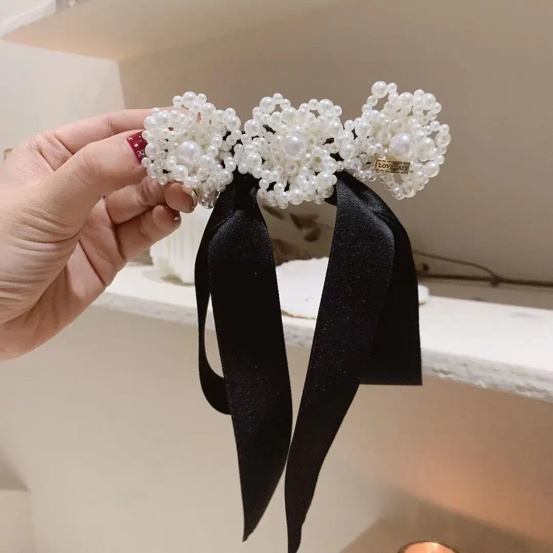 Hair Clips Korea Tassel Bow Spring Pearl Hollow Flower Fairy Top Hairpins Fashion Hair Accessories for Ponytail Holder
Hair Clips Korea Tassel Bow Spring Pearl Hollow Flower Fairy Top Hairpins Fashion Hair Accessories for Ponytail Holder