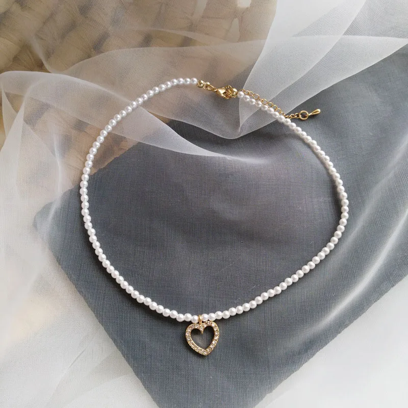New Sweet Heart Pendant Necklace Women Jewelry Necklace Simple Design Small Simulated Pearls Bracelet with Delicate Jewelry Gift
New Sweet Heart Pendant Necklace Women Jewelry Necklace Simple Design Small Simulated Pearls Bracelet with Delicate Jewelry Gift