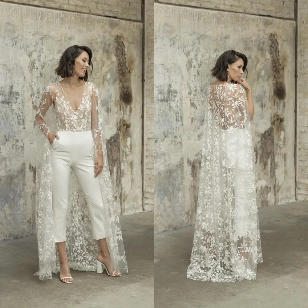 New Wedding Jumpsuit With Cape Beach Wedding Dresses V Neck Tea Length Lace Bridal Outfit Wedding Gowns 2021
New Wedding Jumpsuit With Cape Beach Wedding Dresses V Neck Tea Length Lace Bridal Outfit Wedding Gowns 2021