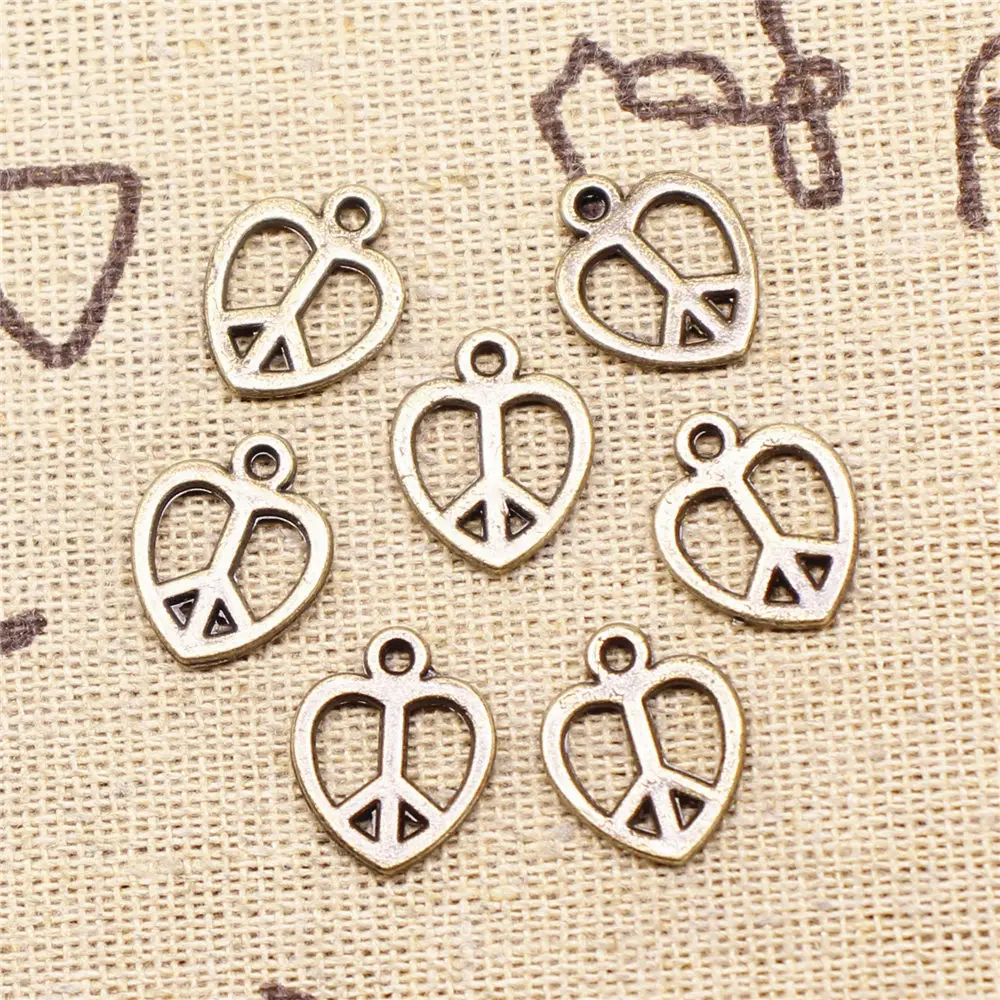Charm For Making Jewelry Pendants Antique Bronze Color Peach Heart Peace 14x11mm 20pcs
Charm For Making Jewelry Pendants Antique Bronze Color Peach Heart Peace 14x11mm 20pcs
