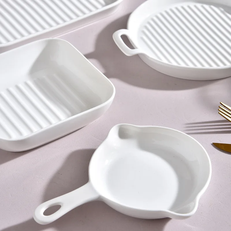 Nordic simple creative binaural baking tray ceramic rectangular ins solid color baking single handle baking tray household
Nordic simple creative binaural baking tray ceramic rectangular ins solid color baking single handle baking tray household