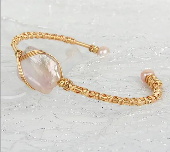 Hand woven Winding 14k Gold injection Baroque jewelry 100% Natural freshwater Pearl bracelet for women
Hand woven Winding 14k Gold injection Baroque jewelry 100% Natural freshwater Pearl bracelet for women