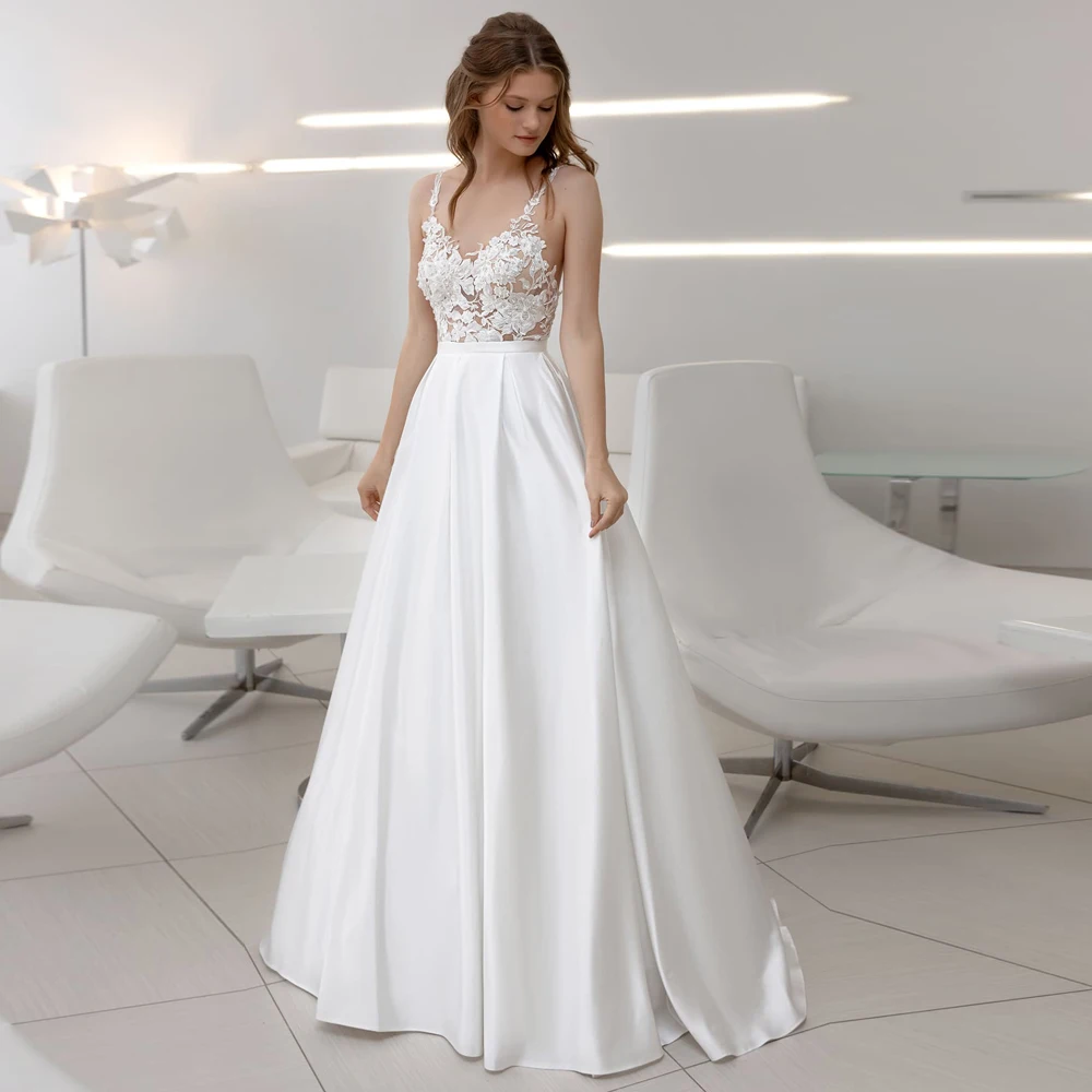 Sexy Spaghetti Straps V Neck Wedding Dresses See-through Lace Applique A-line Bridal Gown Robe De Mariag Open Back Custom Design
Sexy Spaghetti Straps V Neck Wedding Dresses See-through Lace Applique A-line Bridal Gown Robe De Mariag Open Back Custom Design