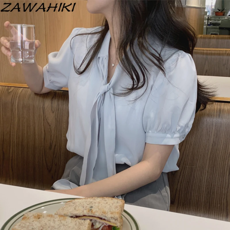 ZAWAHIKI Korean Elegant Tender Women's Blouse Summer V Neck Ribbon Puff Sleeve Short Sleeve Tops Solid Loose Blusas
ZAWAHIKI Korean Elegant Tender Women's Blouse Summer V Neck Ribbon Puff Sleeve Short Sleeve Tops Solid Loose Blusas