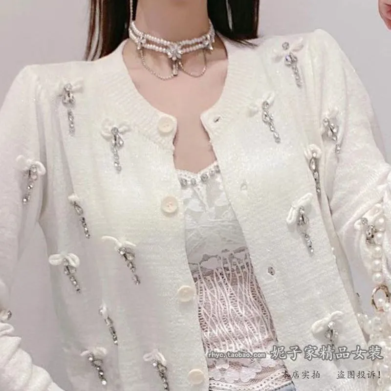 2021 Summer New Knitted Cardigan Sweet Beads Rhinestone Bow Western Style Long Sleeve Sun Protection Knitwear Women Clothing
2021 Summer New Knitted Cardigan Sweet Beads Rhinestone Bow Western Style Long Sleeve Sun Protection Knitwear Women Clothing