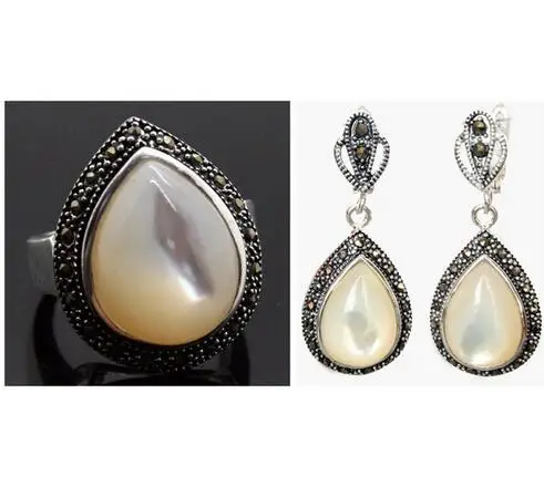 25*20mm Natural White Sea Shell Marcasite earring SILVER RING(SIZE 7/8/9/10) Genuine Handmade Women Gift word 925 silver
25*20mm Natural White Sea Shell Marcasite earring SILVER RING(SIZE 7/8/9/10) Genuine Handmade Women Gift word 925 silver