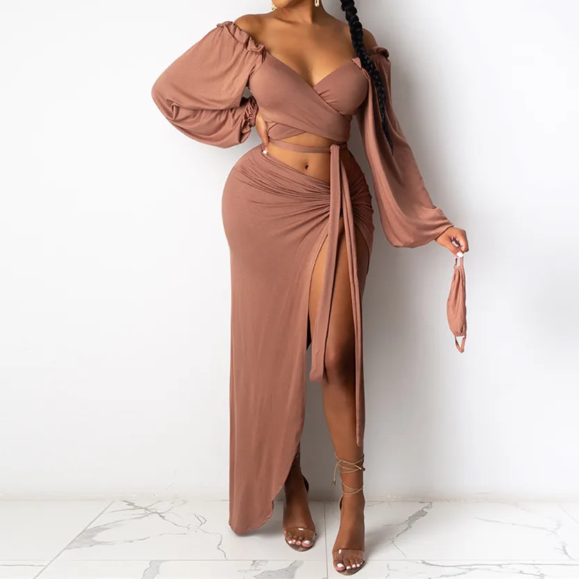 2021 Spring Two Piece Set Women Long Lantern Sleeve Sexy Low Out Tie Up Crop Top Split Long Skirts Party 2 Piece Clothes
2021 Spring Two Piece Set Women Long Lantern Sleeve Sexy Low Out Tie Up Crop Top Split Long Skirts Party 2 Piece Clothes