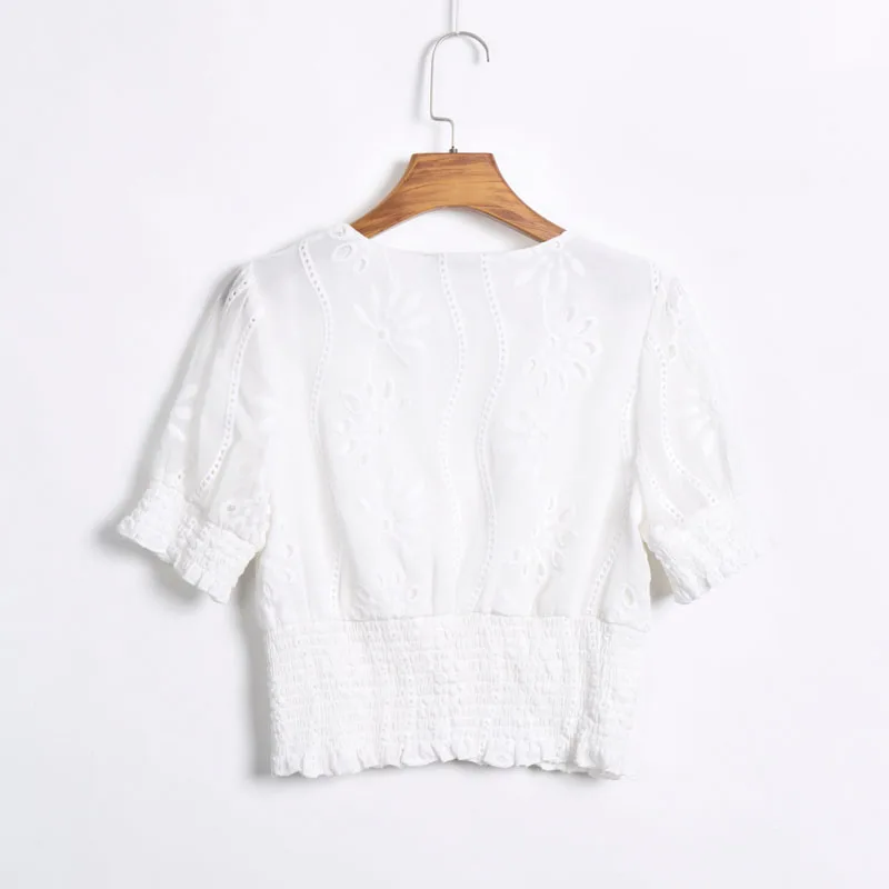 Summer casual solid color shirt female openwork embroidery V-neck short-sleeved shirt
Summer casual solid color shirt female openwork embroidery V-neck short-sleeved shirt