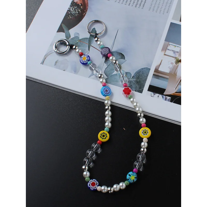 Fashion European And American Pearl Jewelry Short Clay Mobile Phone Chain For Woman
Fashion European And American Pearl Jewelry Short Clay Mobile Phone Chain For Woman