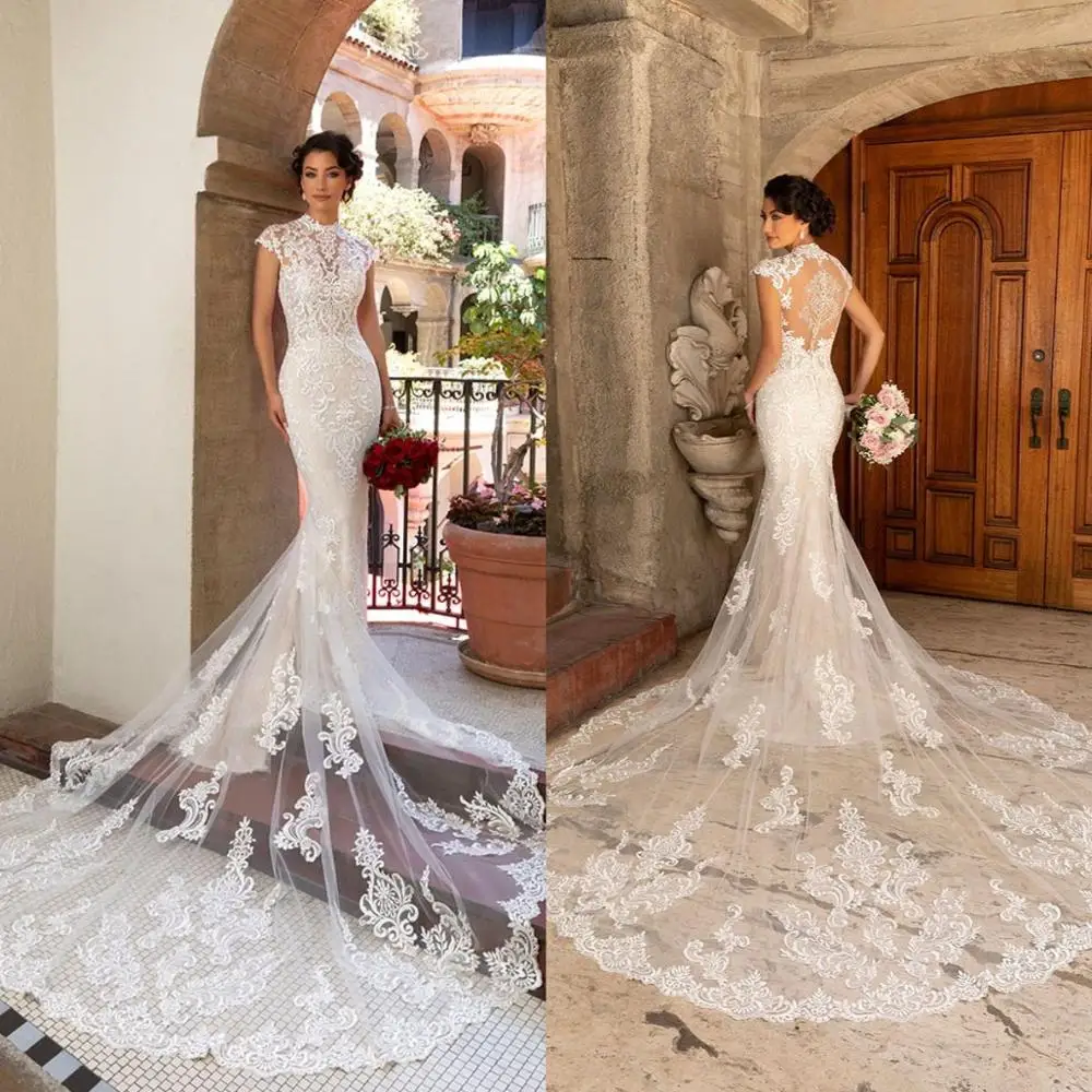 2021 Wedding Dresses High Collar Lace Appliques Mermaid Bridal Gowns Capped Sleeves Button Back Wedding Dress Vestidos De Novia
2021 Wedding Dresses High Collar Lace Appliques Mermaid Bridal Gowns Capped Sleeves Button Back Wedding Dress Vestidos De Novia