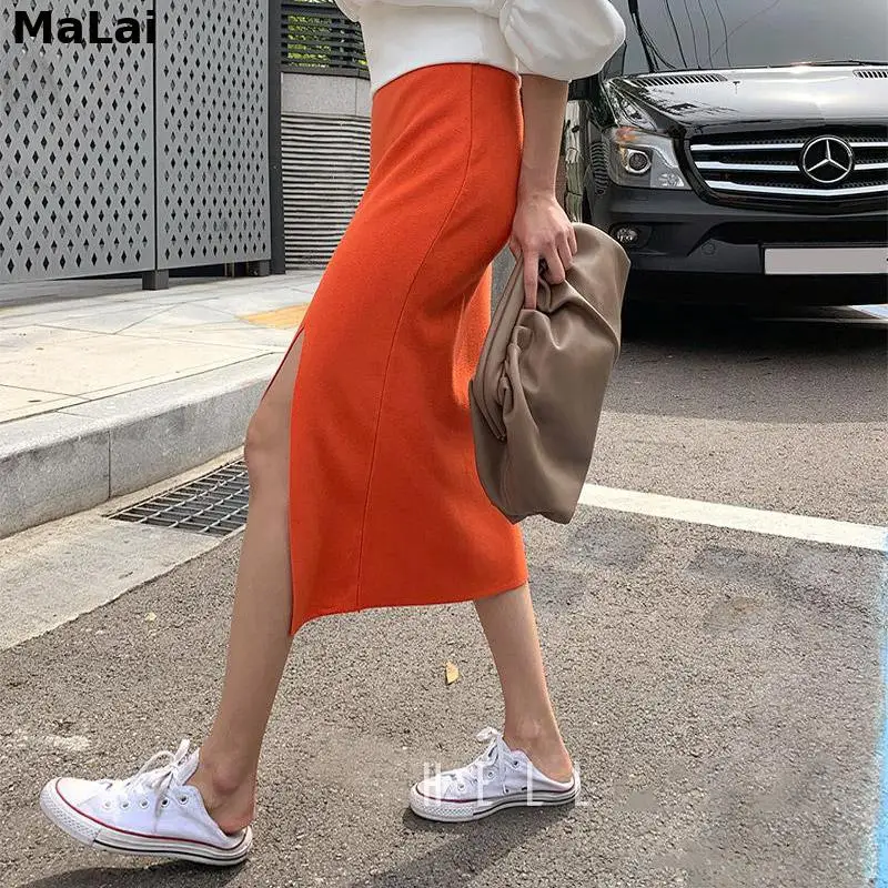 Elegant X049 Orange Knitted Skirts Women Elastic Waist Split Pencil Skirt Korean Casual Bodycorn Long Midi Skirt Sweet Vintage
Elegant X049 Orange Knitted Skirts Women Elastic Waist Split Pencil Skirt Korean Casual Bodycorn Long Midi Skirt Sweet Vintage