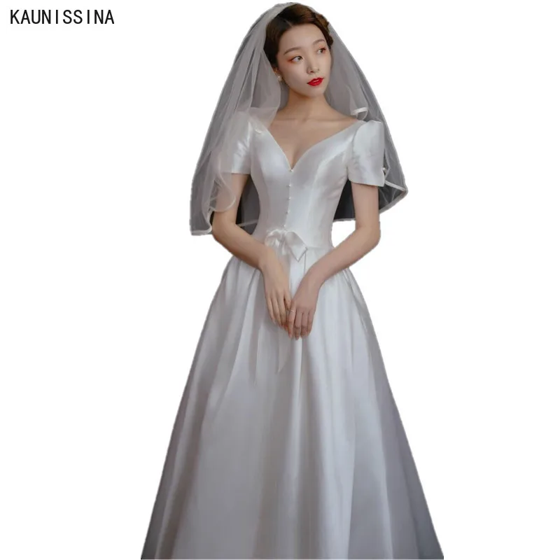 KAUNISSINA Boho Wedding Dresses Puff Sleeves A Line White Satin Princess Beach Bride Wedding Gowns Elegant Simple Bridal Dress
KAUNISSINA Boho Wedding Dresses Puff Sleeves A Line White Satin Princess Beach Bride Wedding Gowns Elegant Simple Bridal Dress
