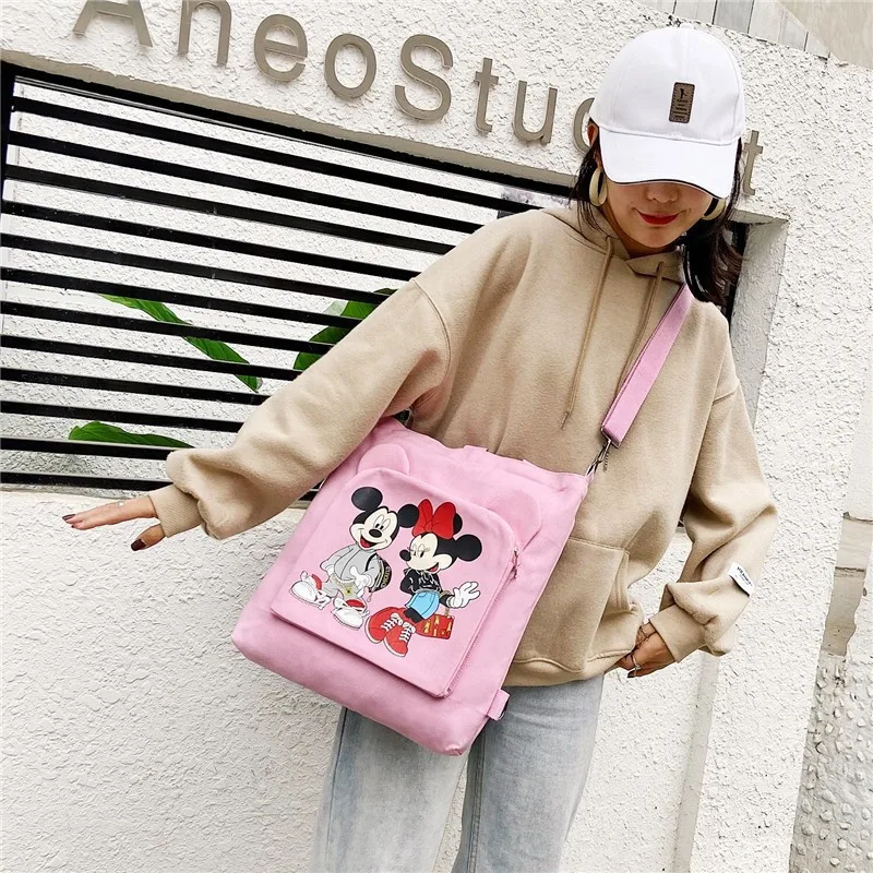 Disney Ladies Shoulder Bag Cartoon Mickey Cute Multifunctional Large Capacity Canvas Fashion Storage Student Portable Backpack
Disney Ladies Shoulder Bag Cartoon Mickey Cute Multifunctional Large Capacity Canvas Fashion Storage Student Portable Backpack