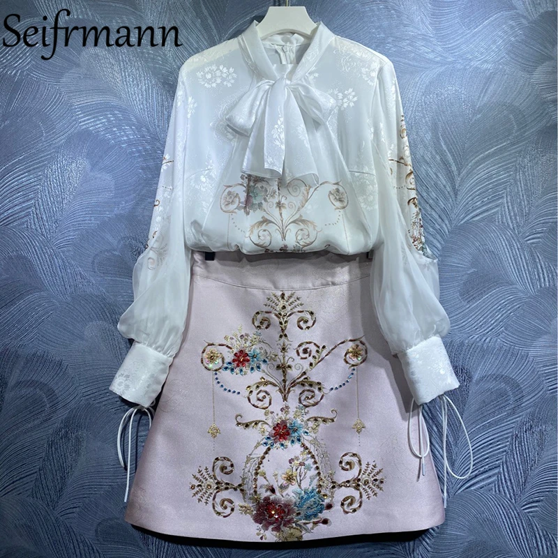Seifrmann New 2021 Autumn Women Fashion Designer Skirt Sets Lantern Sleeve Bow Tops + High Waist Crystal A-Line Skirts Suits
Seifrmann New 2021 Autumn Women Fashion Designer Skirt Sets Lantern Sleeve Bow Tops + High Waist Crystal A-Line Skirts Suits