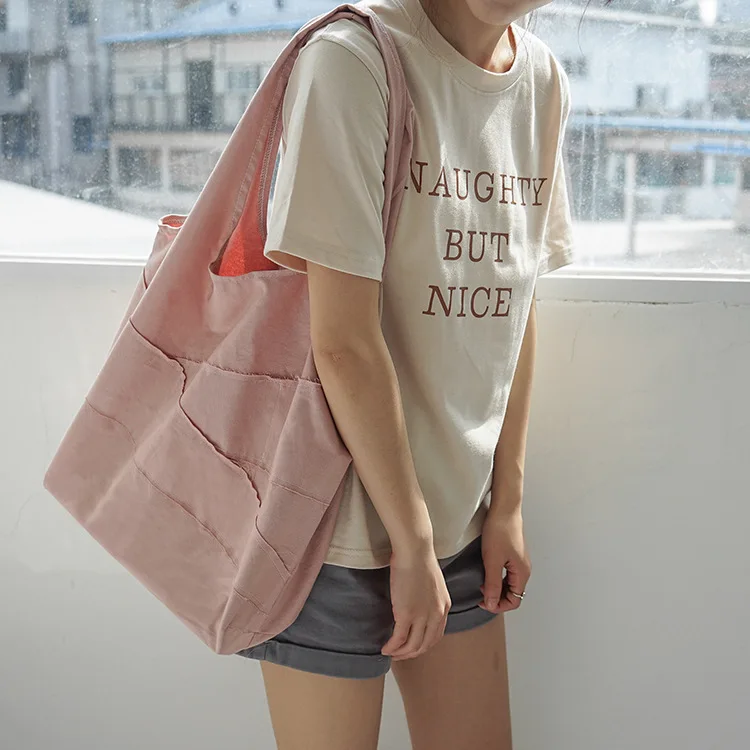 New twill cotton shoulder bag fashion handbag Korean version of the solid color stitching cloth bag shoulder bag
New twill cotton shoulder bag fashion handbag Korean version of the solid color stitching cloth bag shoulder bag