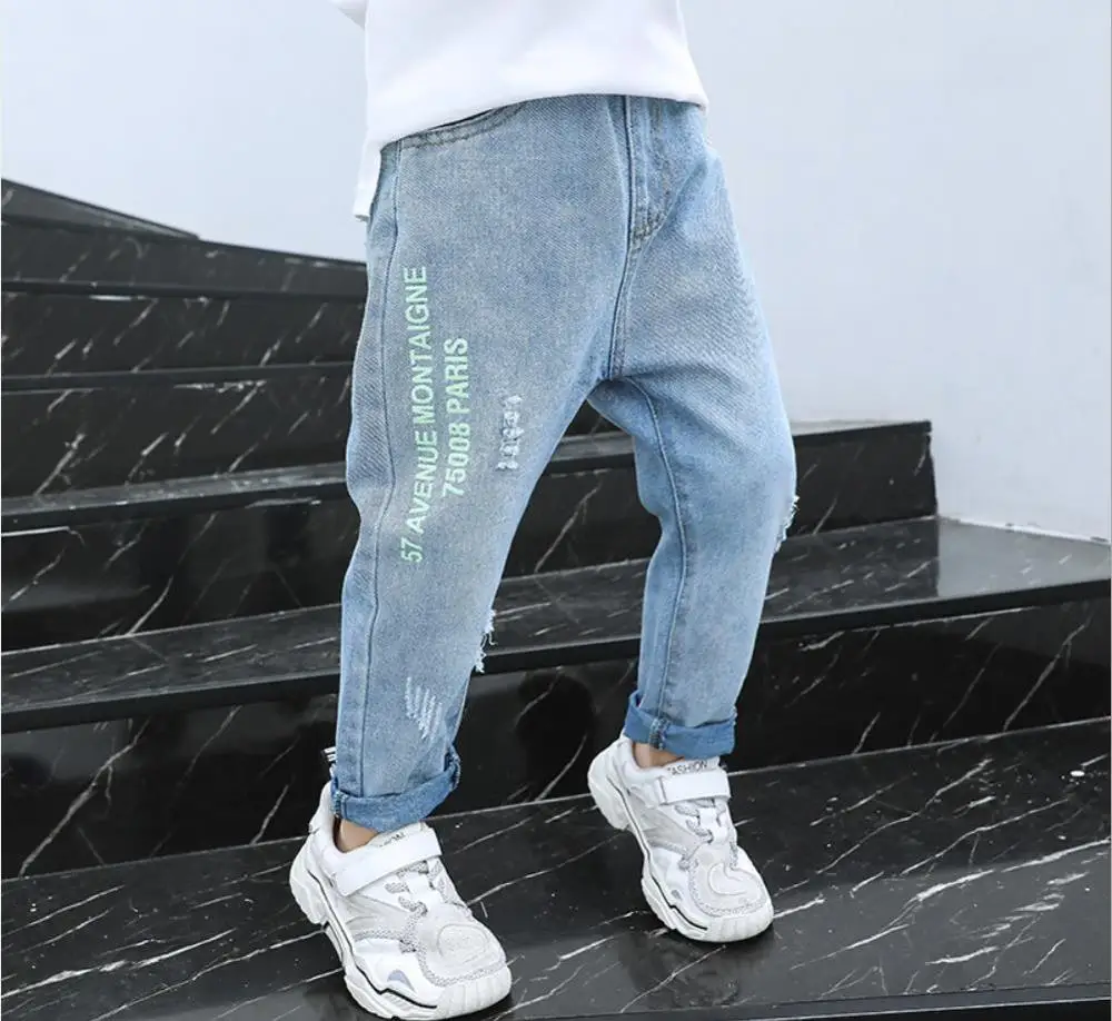 Джинсы для мальчиков, весна-осень 2020, новые детские штаны, детская одежда, повседневные брюки для маленьких мальчиков, детские джинсы с прин...
Джинсы для мальчиков, весна-осень 2020, новые детские штаны, детская одежда, повседневные брюки для маленьких мальчиков, детские джинсы с прин...