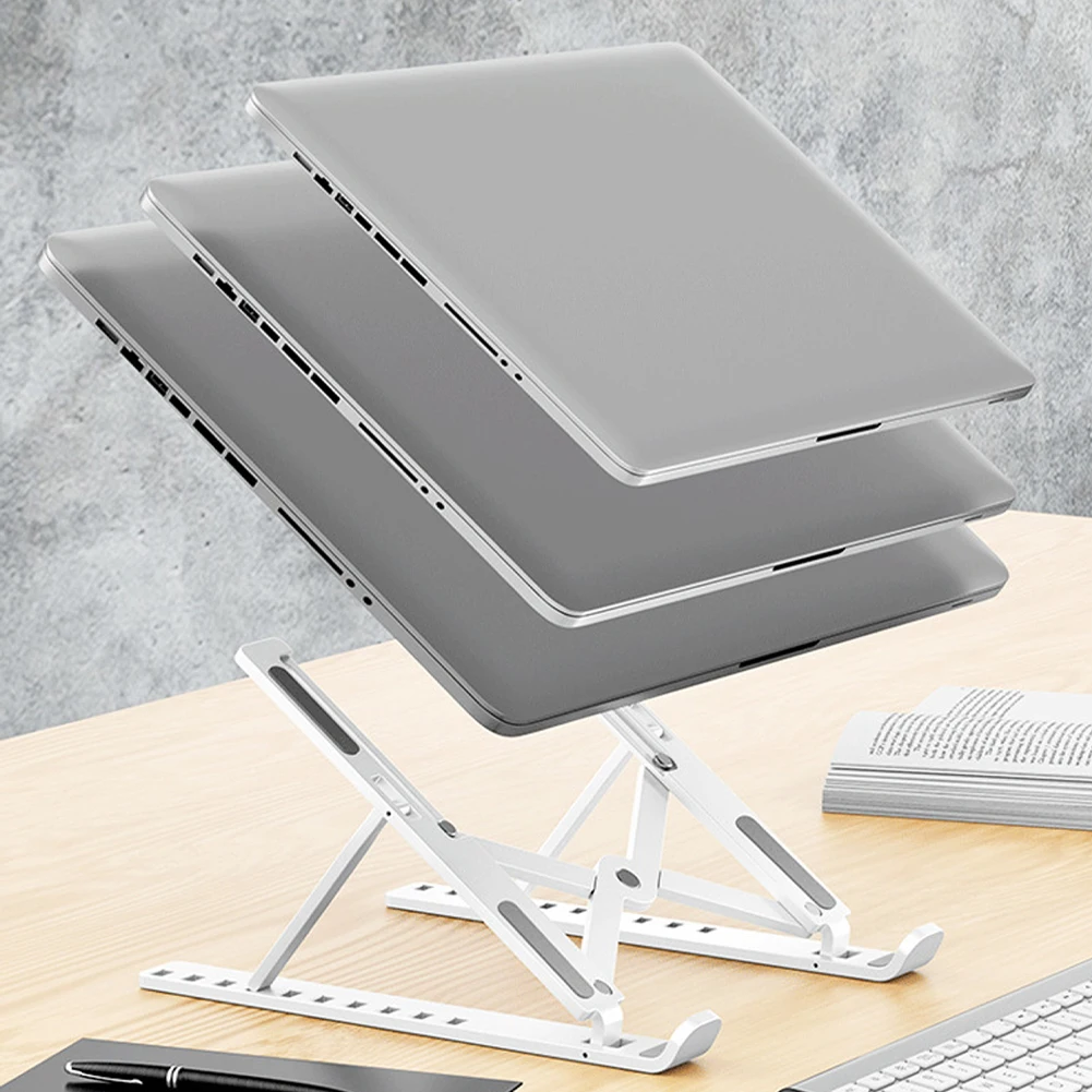 Laptop Stand Portable Foldable Support Desktop Adjustable Lightweight Suporte DobráVel Liga Suitable For Macbook Computer Holder
Laptop Stand Portable Foldable Support Desktop Adjustable Lightweight Suporte DobráVel Liga Suitable For Macbook Computer Holder