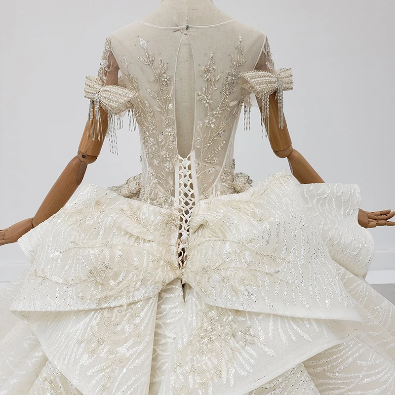 AnXin SH luxury princess beading crystal illusion ruffles handmade o neck big bow flower white lace wedding dress 100%real photo
AnXin SH luxury princess beading crystal illusion ruffles handmade o neck big bow flower white lace wedding dress 100%real photo