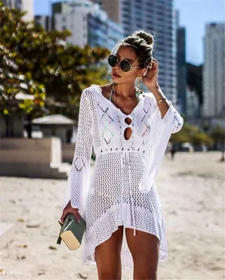 Hollow sunscreen shirt trumpet sleeve beach blouse bikini outer blouse European and American hot style sweater swimsuit
Hollow sunscreen shirt trumpet sleeve beach blouse bikini outer blouse European and American hot style sweater swimsuit