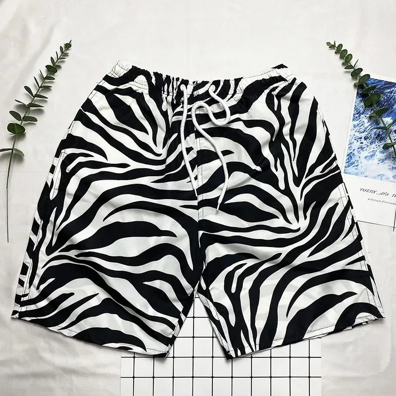 Men's beach pants summer casual shorts seaside quick-drying pants plus size loose sports pants printed elastic pants
Men's beach pants summer casual shorts seaside quick-drying pants plus size loose sports pants printed elastic pants