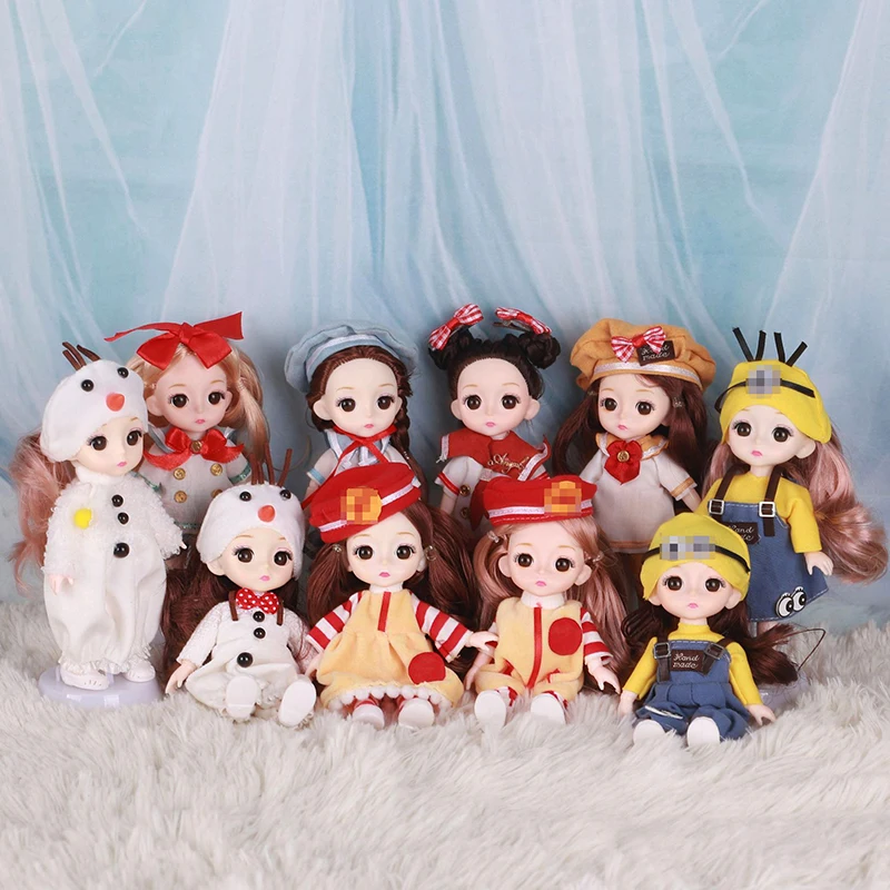 New Cute College 16CM BJD Doll with Clothes Headwear 13 Joints Fashion Cartoons Baby Random Head Dress Up Toys for Girls Gift
New Cute College 16CM BJD Doll with Clothes Headwear 13 Joints Fashion Cartoons Baby Random Head Dress Up Toys for Girls Gift