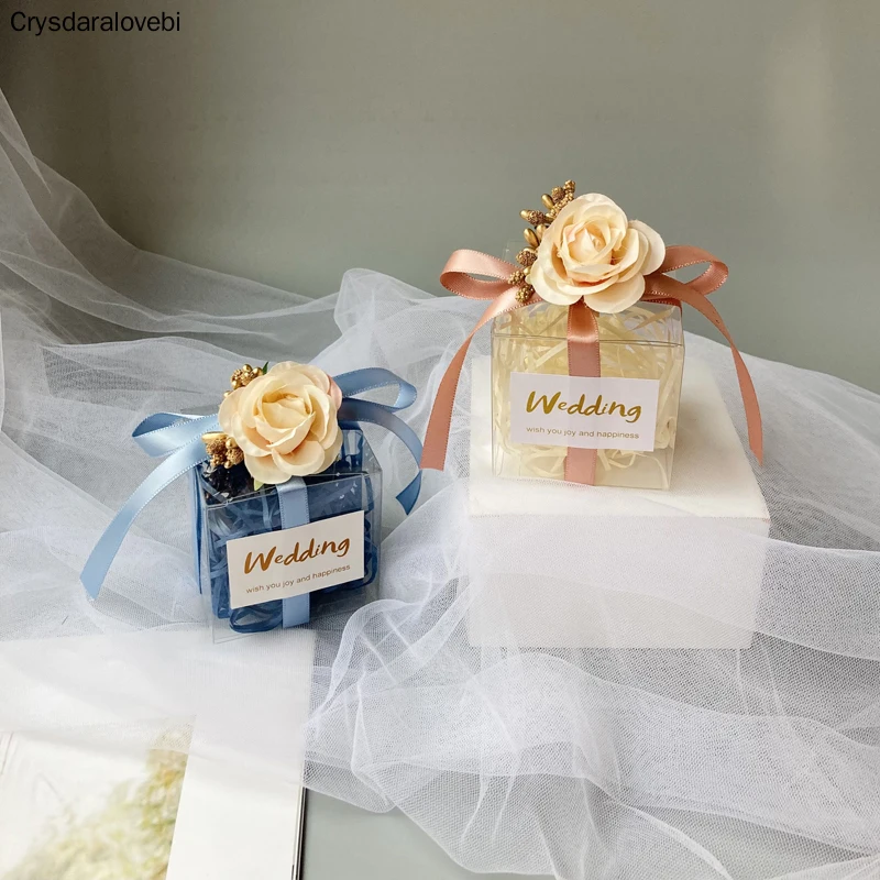 25pcs PVC Clear Flower Candy Boxes Wedding Decorations Party Supplies Gift Box Baby Shower Favors Candy Box with Ribbon Rose
25pcs PVC Clear Flower Candy Boxes Wedding Decorations Party Supplies Gift Box Baby Shower Favors Candy Box with Ribbon Rose