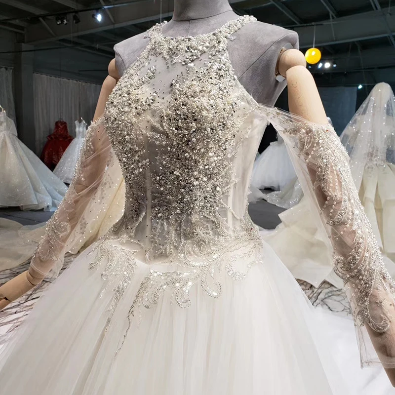 HTL1046 Halter Sequin White Wedding Dress Illusion Wedding Dress Sleeves Cut Out Pearl Rhinestone Zip gothic wedding dress
HTL1046 Halter Sequin White Wedding Dress Illusion Wedding Dress Sleeves Cut Out Pearl Rhinestone Zip gothic wedding dress