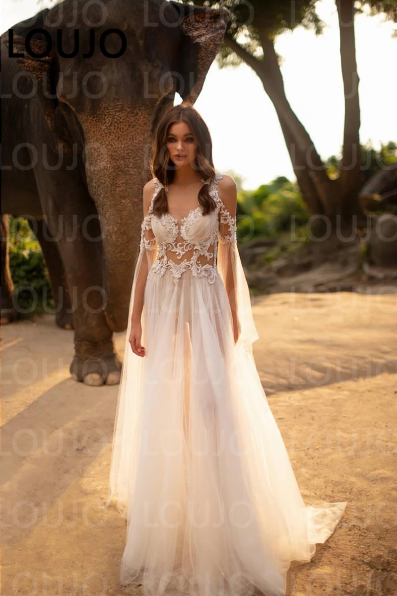 LUOJO Boho Beach Wedding Dresses Flare Sleeves Lace Sheer Illusion Tulle Bride Dress A-Line Summer Wedding Gown Sexy Transparent
LUOJO Boho Beach Wedding Dresses Flare Sleeves Lace Sheer Illusion Tulle Bride Dress A-Line Summer Wedding Gown Sexy Transparent