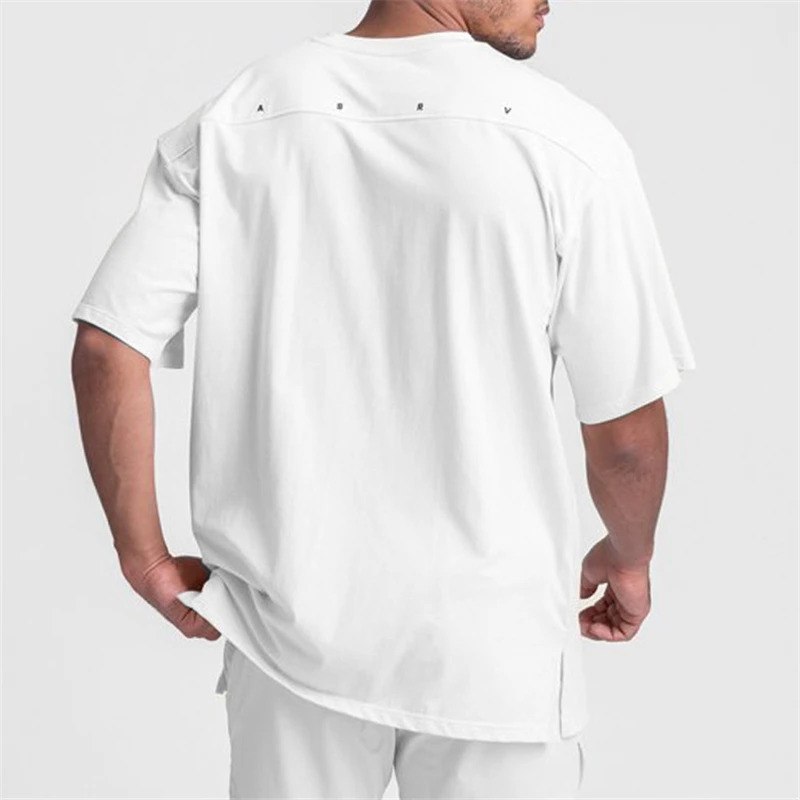 Oversize Workout Loose Fitness Gyms T Shirts Mens Short Sleeve T-shirt Muscle Gyms Fitness Clothing Bodybuilding Tees Tops
Oversize Workout Loose Fitness Gyms T Shirts Mens Short Sleeve T-shirt Muscle Gyms Fitness Clothing Bodybuilding Tees Tops