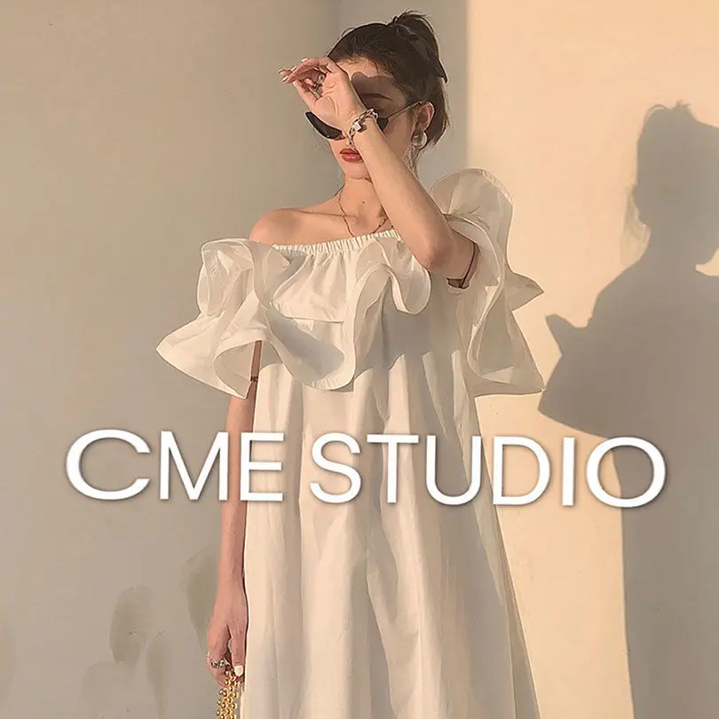 One line shoulder dress women's summer 2021 new loose seaside long skirt Ruffle Skirt sexy open back beach skirt